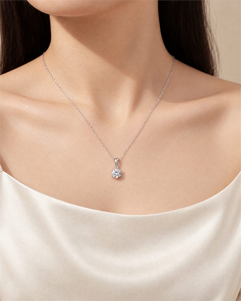 Worn with an ivory silk neckline